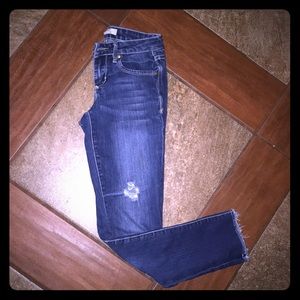 Distressed hem, skinny jean